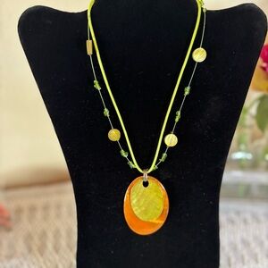 Vicky Jousan layered pendant orange, green oval base necklace.